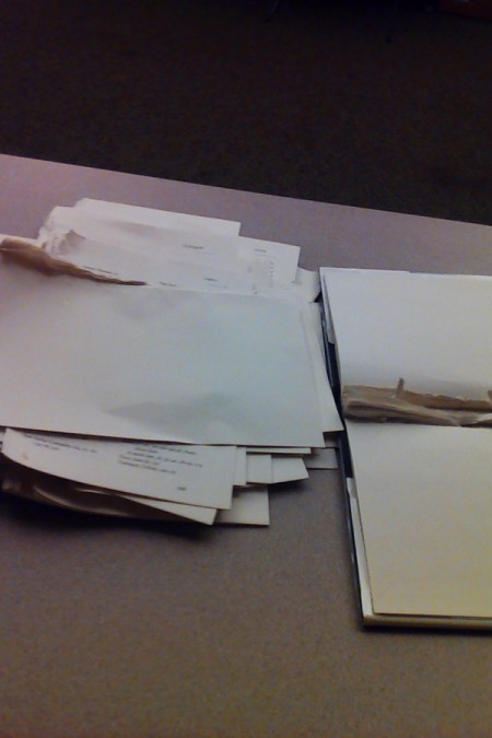 A stack of pages from a book.