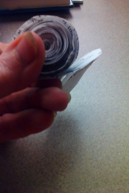 A tightly wound rosette from a paper spiral.