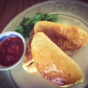 A plate of pizza dough empanadas