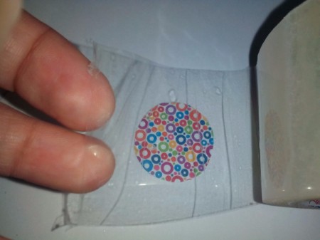 Covering back of the frame with tape.