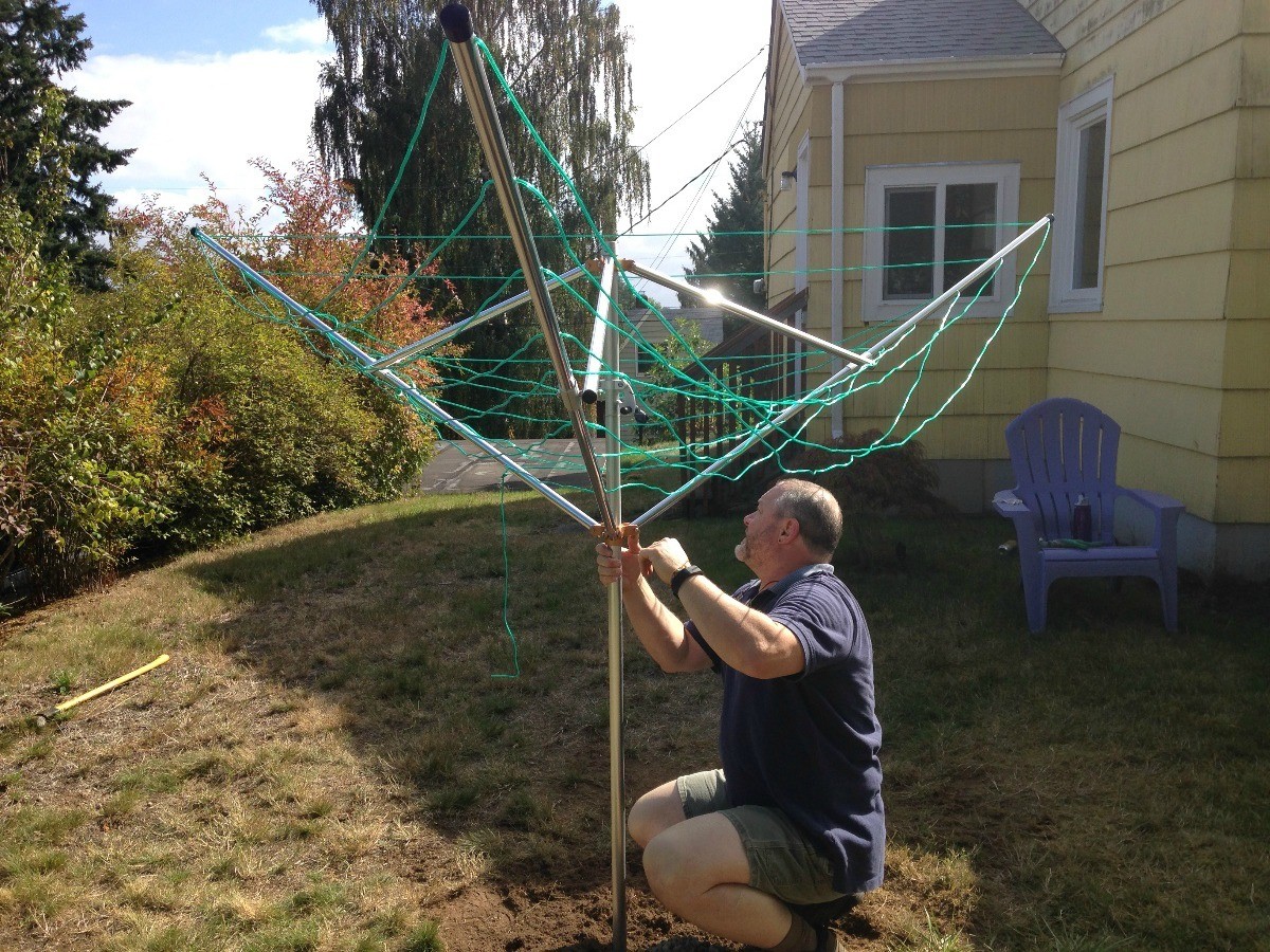 installing-a-breezecatcher-rotary-clothesline-thriftyfun