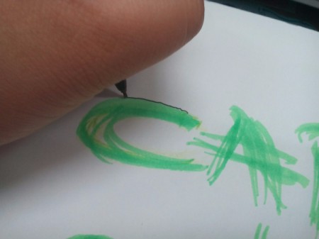 tracing around the marker letters with a pen