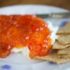 Pepper jelly over cream cheese served with Triscuits.