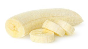 Peeled banana partially cut into slices