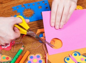 Closeup of someone cutting craft foam