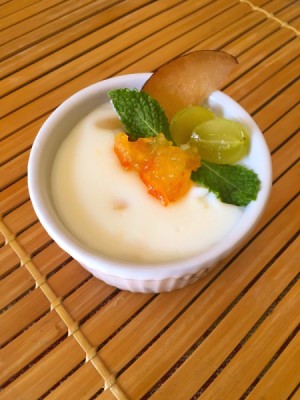 Garnished bowl of rice pudding.