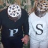 A couple dressed up as salt and pepper.