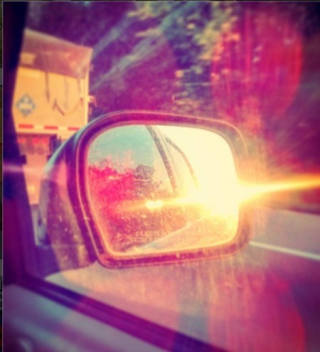 sunset in rearview mirror