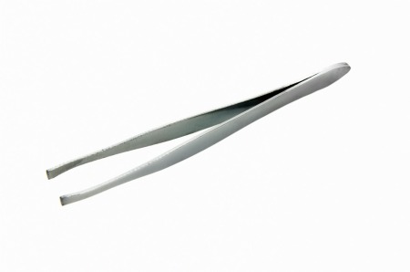 A pair of metal tweezers isolated on white