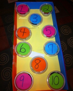 finished box with multicolored lids showing