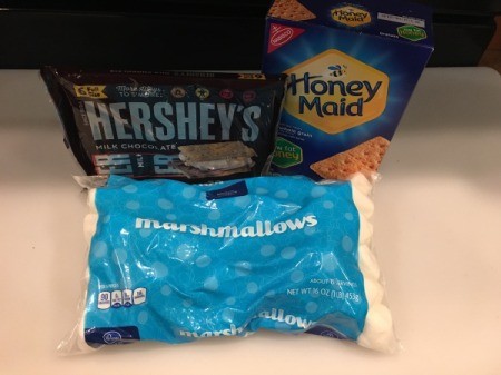 Bag of marshmallows, Hershey Chocolate bars, Honeymaid graham crackers.