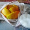 A bag of bath salt with oranges.