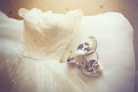 A wedding dress and shoes.