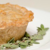 Whole Wheat Vegetarian Pot Pie with a sprig of thyme.