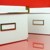 White Storage Containers on a red background.