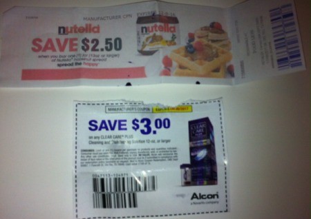 Some coupons cut out of the paper.