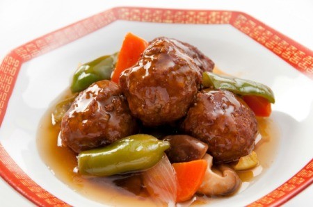 Meatballs with bell peppers and mushrooms.