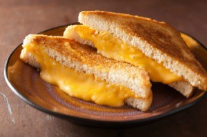 A grilled cheese sandwich made with American block cheese.