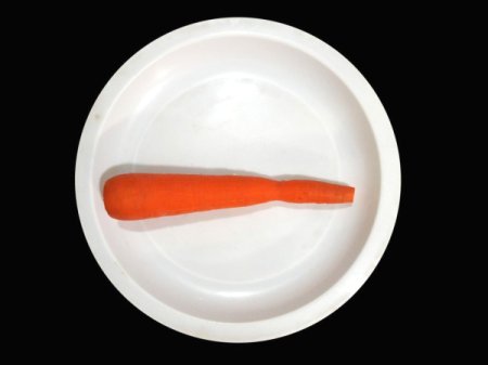 A carrot with the skin removed.