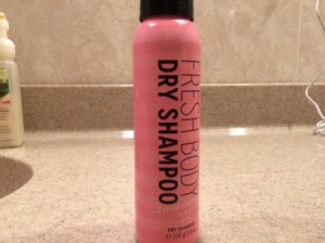 A bottle of dry shampoo.