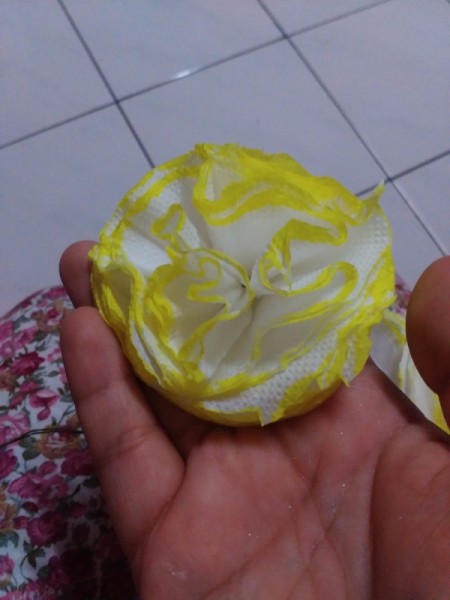 finished yellow edged paper flower