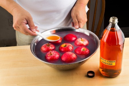 Apple cider vinegar being used as a pesticide wash.