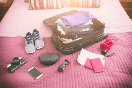 A well packed suitcase with travel basics.