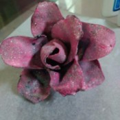 glittery mauve painted plastic spoon flower