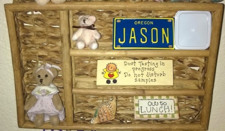 A wicker silverware tray with knicknacks