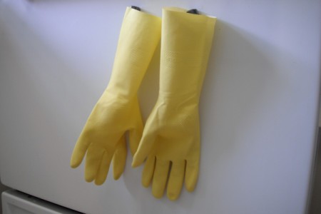 gloves hanging on the stove