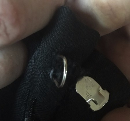 A binder clip prong for the hook closure on pants.