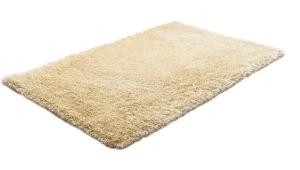 A wool rug laying on the floor.