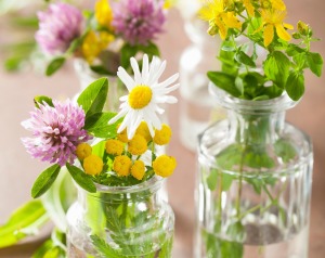 Jars used as flower vases for a church banquet.