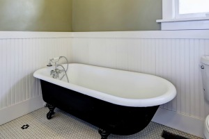 A claw foot tub in a bathroom.