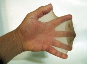 A hand inside a pair of pantyhose.