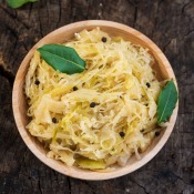 A bowl of cooked cabbage.