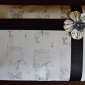 A hand stamped gift wrapped package.