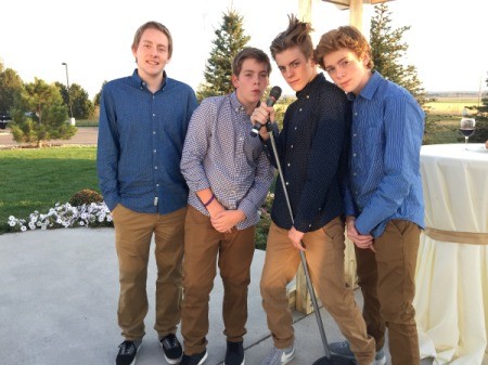 photo of 4 teen boys