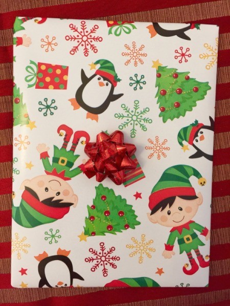 Finished present with a bow in the center.