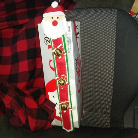 Santa door hanger on carton of Coke