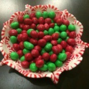 A bowl made of melted peppermint starlight candies, filled with M&Ms