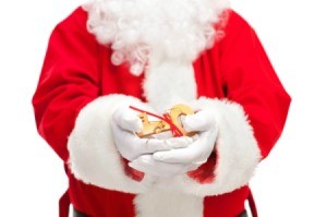 Santa holding a large magic key.