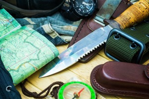 A knife, map, compass and other items helpful when hunting or fishing.