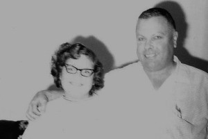 A black and white photo of a couple.