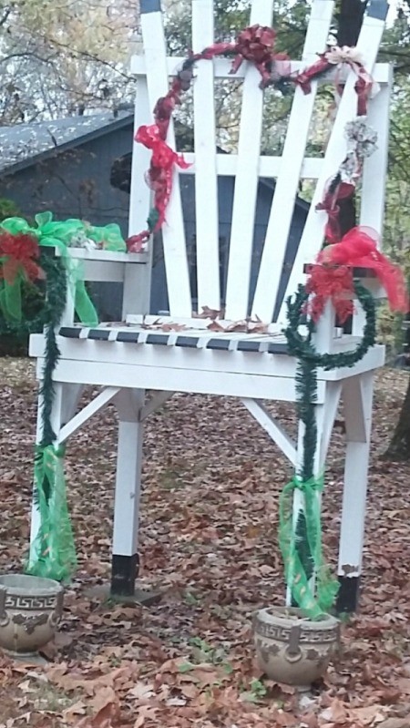 large white chair decorated for Christmas