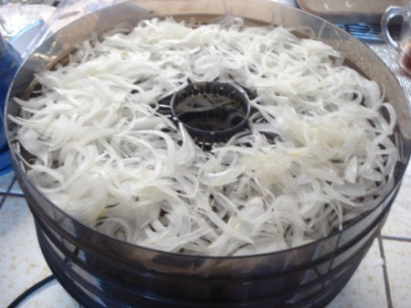 sliced onion cooking in pan