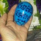 A plastic Easter egg with bulbs inside.