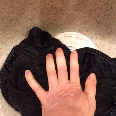How to Wash a Cashmere Sweater - pat out as much water as possible