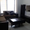 small living room with dark furniture