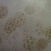 How can you get tire marks off of vinyl floors?